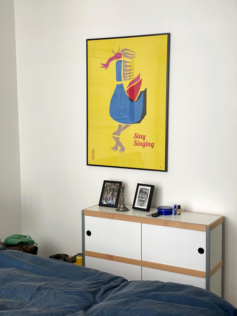 Crealuras poster 'Stay Singing' at home in frame